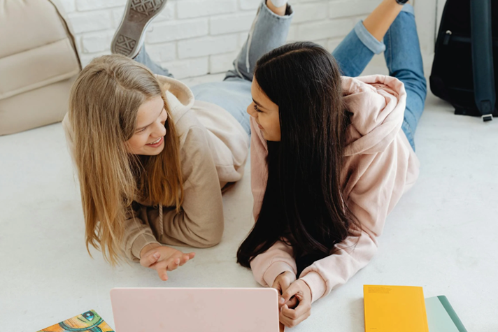 two girls studying together